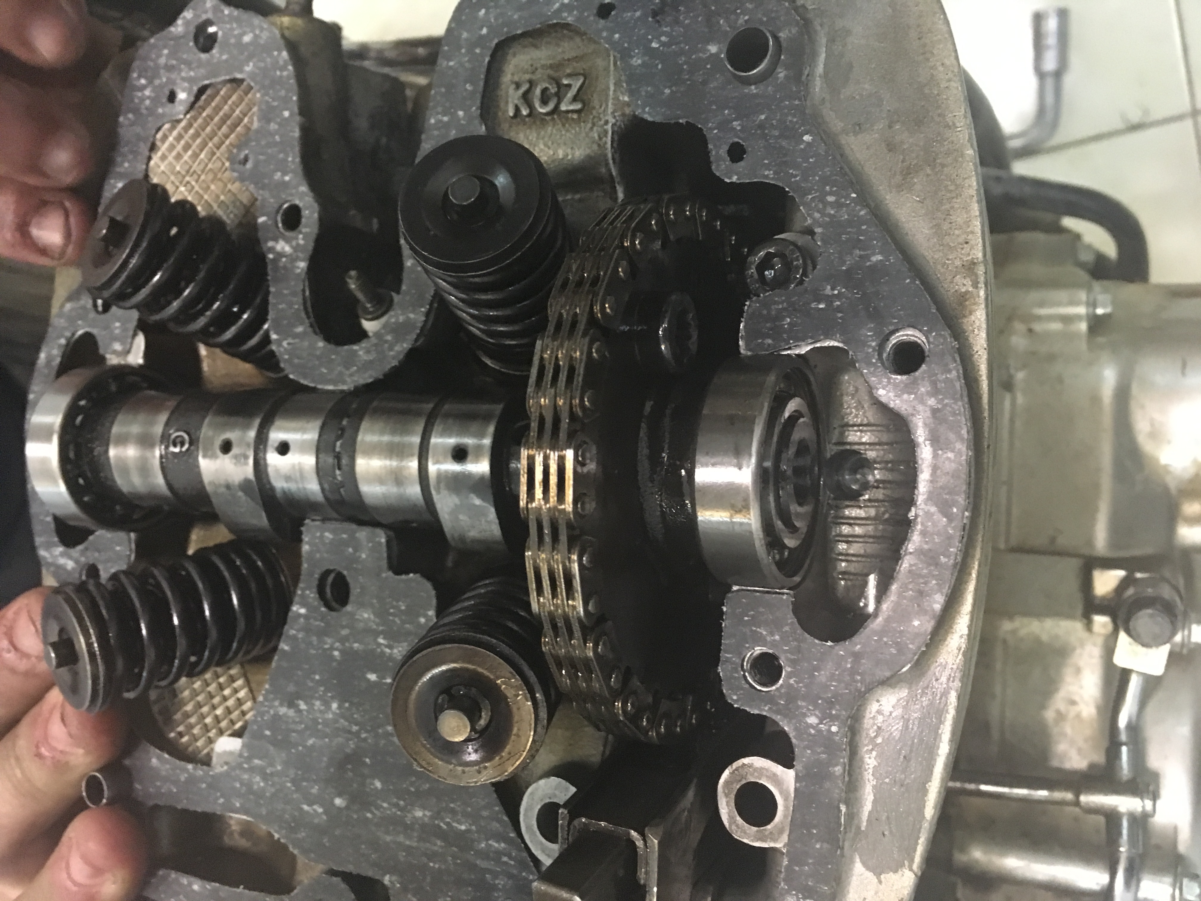 Adjusting the valves on a one cylinder engine.